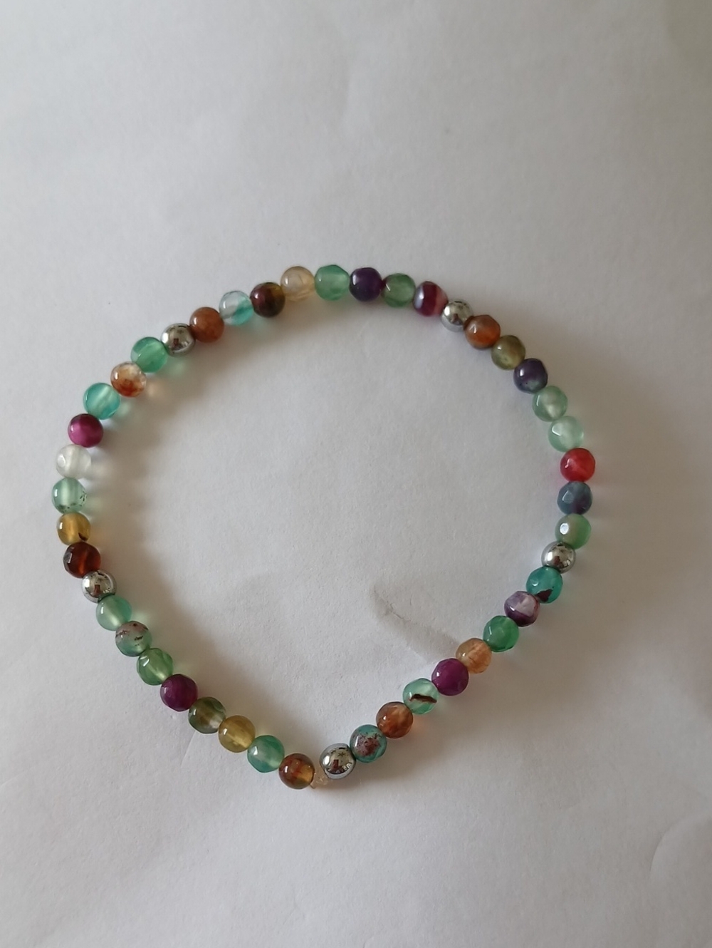 Multicolor Natural Gemstone Beaded Bracelet With Hematite Accent Beads.